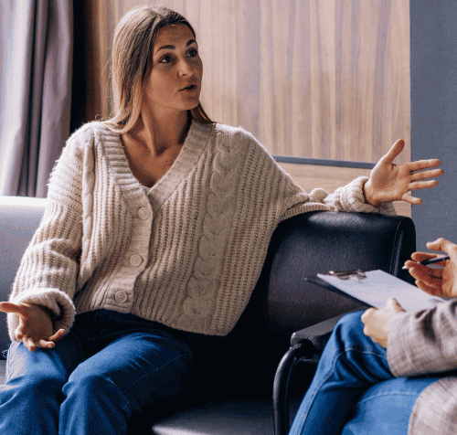 Patient talks to a drug and alcohol addiction therapist