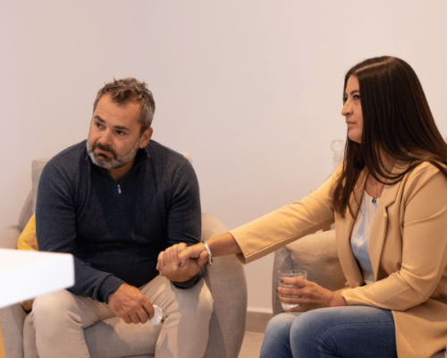 Mature couple talking to an unseen therapist