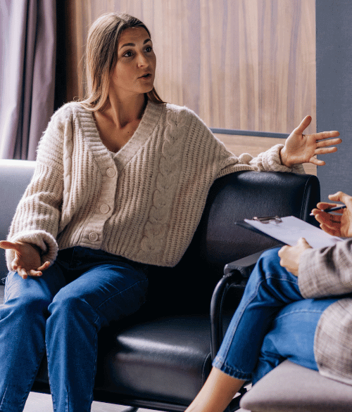 A client and therapist talking about the types of mental health therapy and counseling