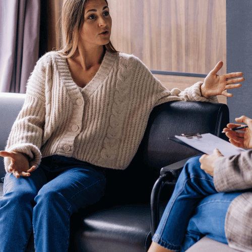 A client and therapist talking about the types of mental health therapy and counseling