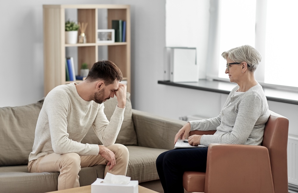 Man experiencing symptoms which are part of the dangers of detoxing cold turkey