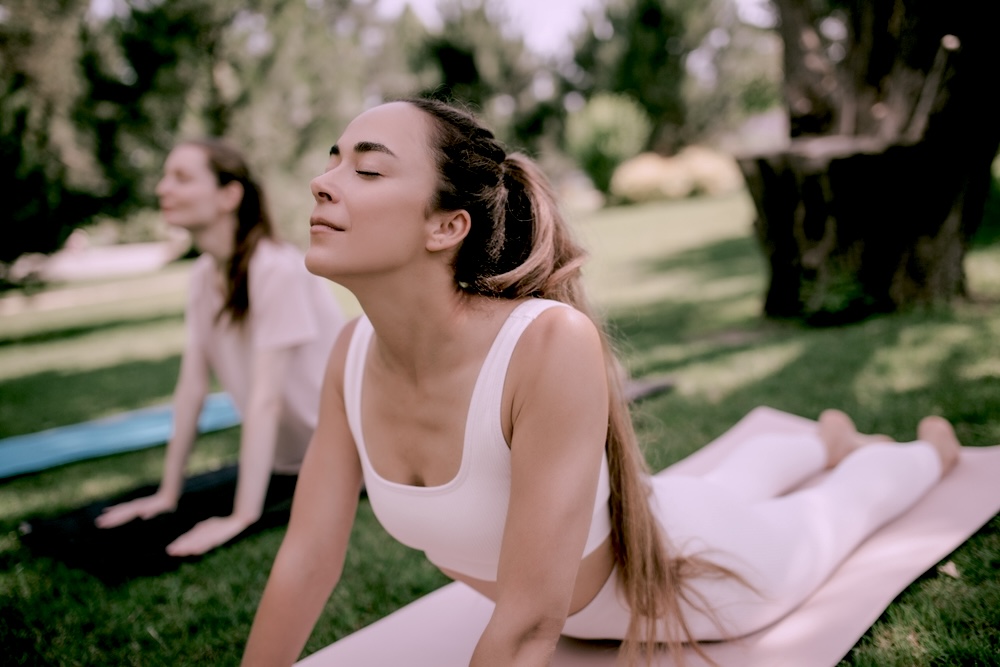 Women practicing yoga as part of holistic addiction treatment in Los Angeles CA